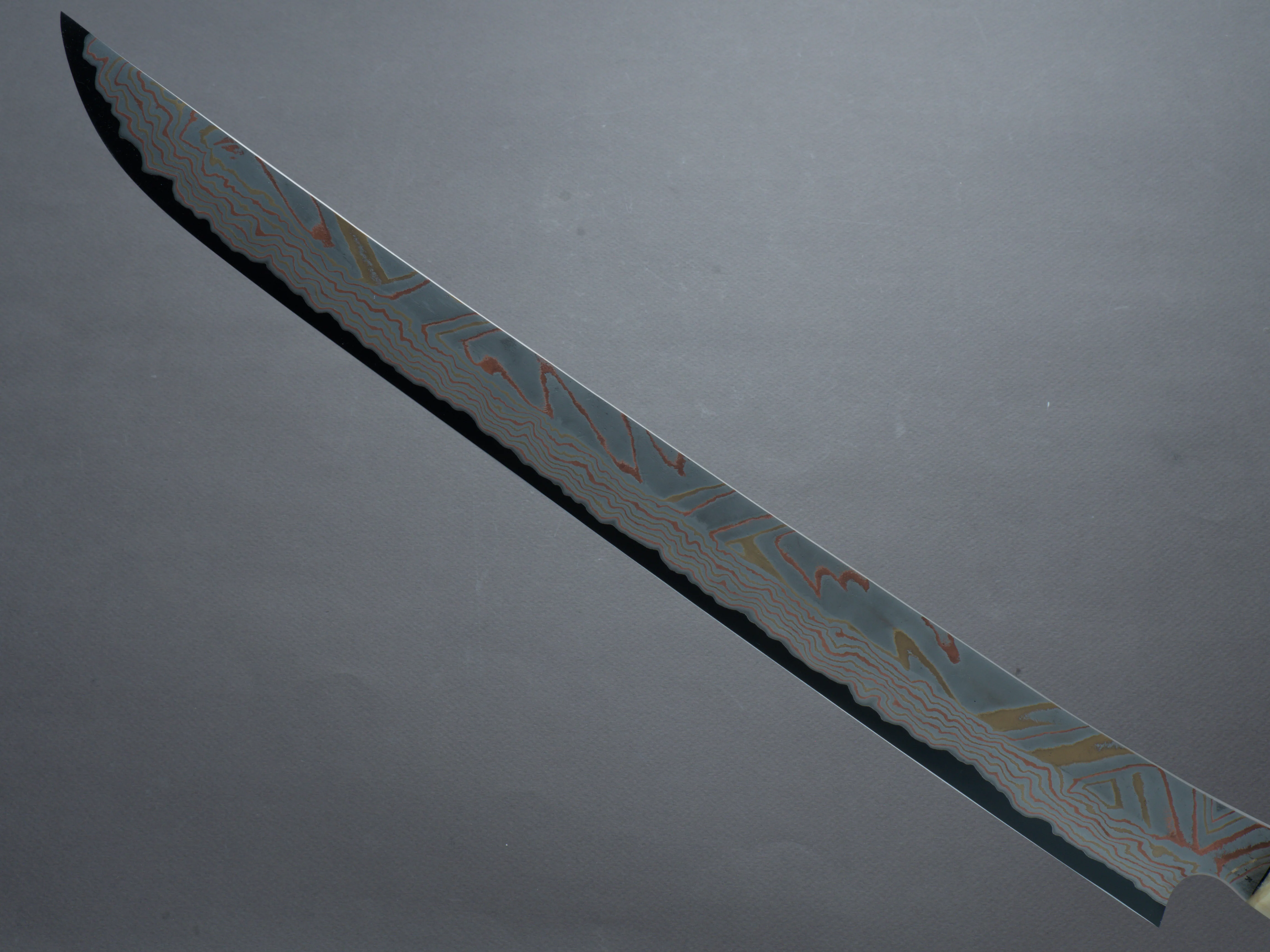 Nigara Hamono - Kurozome Rainbow Damascus - Blue #2 Forced Patina - 450mm Saber Sujihiki - Karin Burl Handle - Custom Sandalwood Saya - Image 4