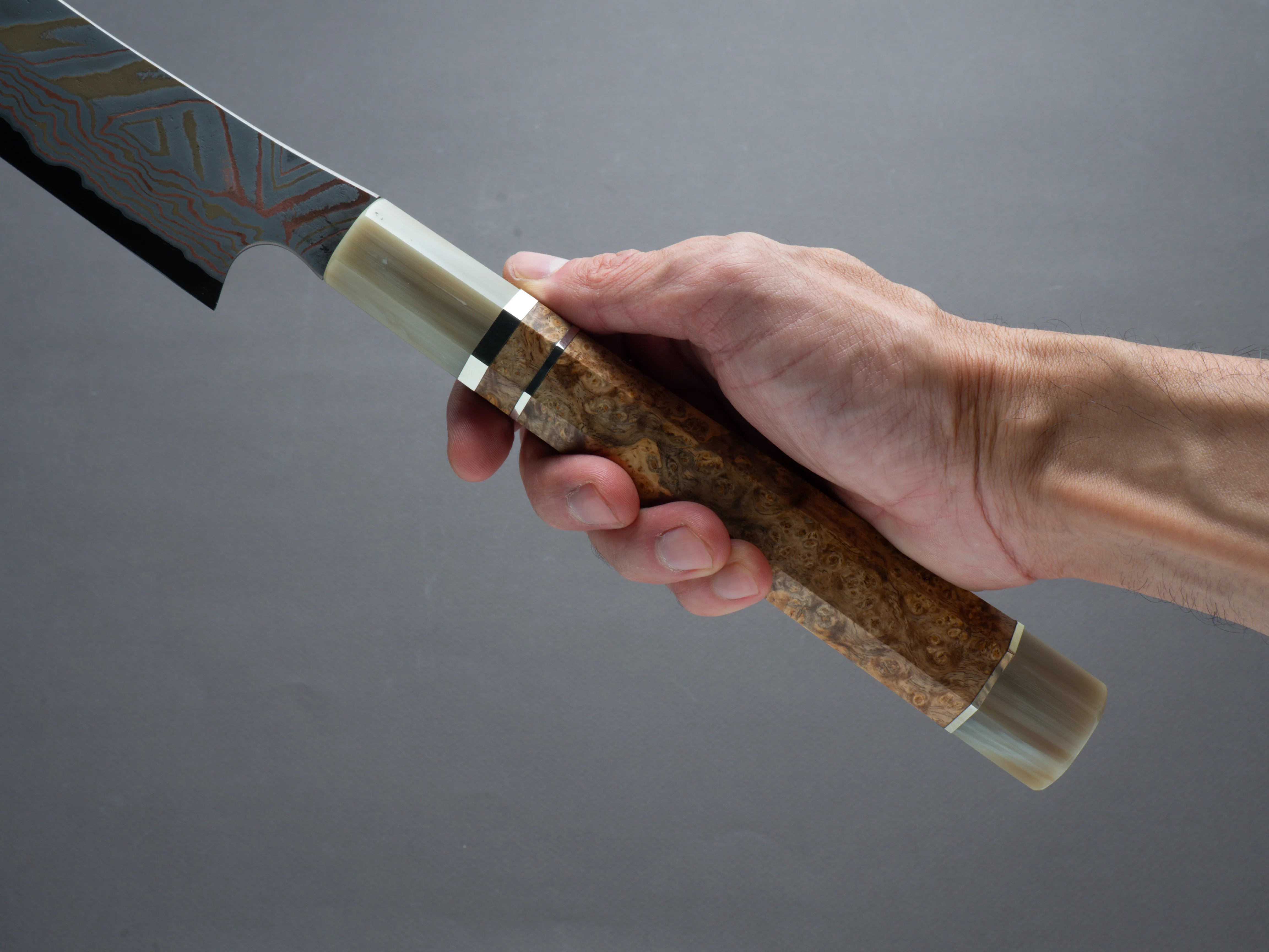 Nigara Hamono - Kurozome Rainbow Damascus - Blue #2 Forced Patina - 450mm Saber Sujihiki - Karin Burl Handle - Custom Sandalwood Saya - Image 6