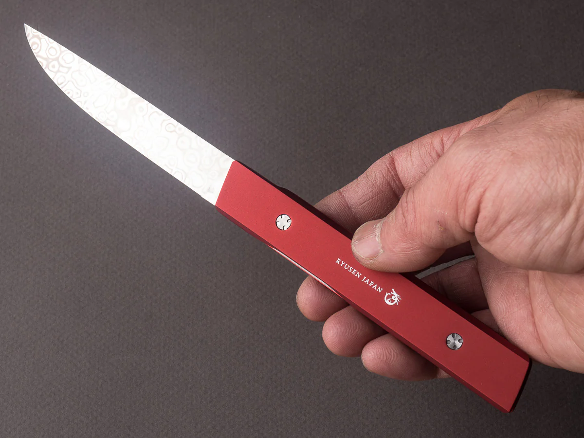Ryusen - SK07 - Single Bevel Folding Steak Knife - Coreless Damascus - Coral Red Handle w/ Red Stitch Leather Case - Image 4