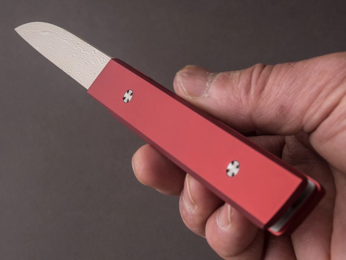 Ryusen - SK07 - Single Bevel Folding Steak Knife - Coreless Damascus - Coral Red Handle w/ Red Stitch Leather Case - Image 8